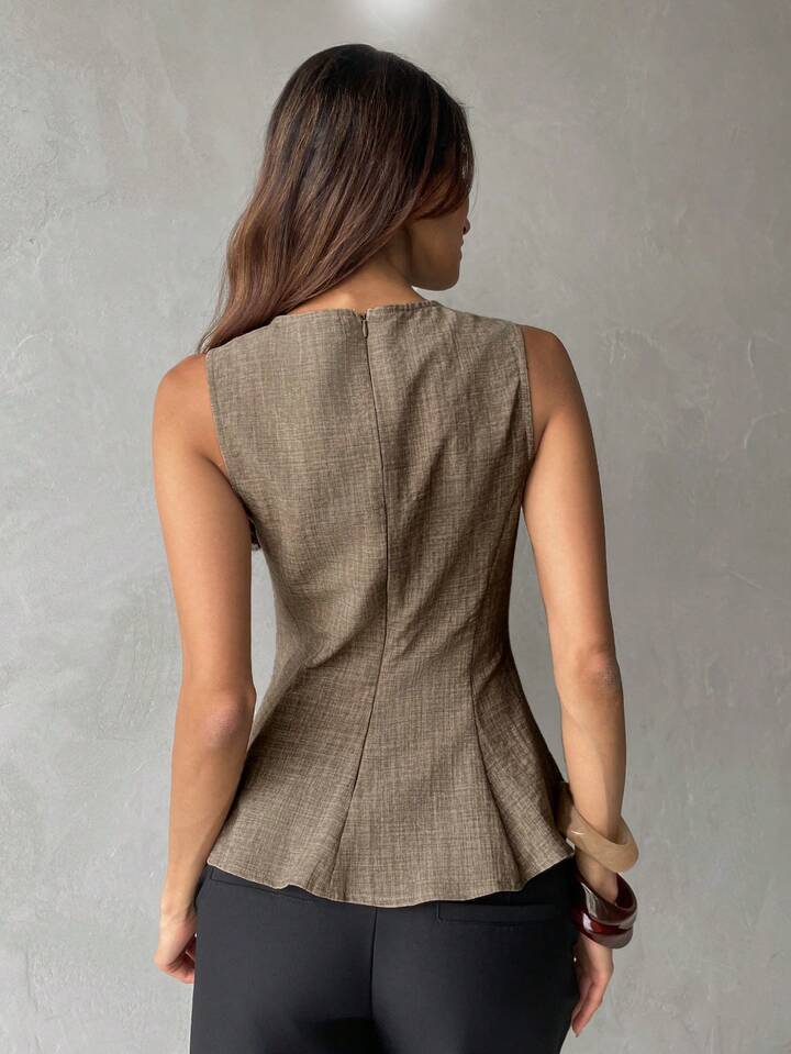 Modern Sleeveless Peplum Blouse with Elegant Asymmetric Hem
