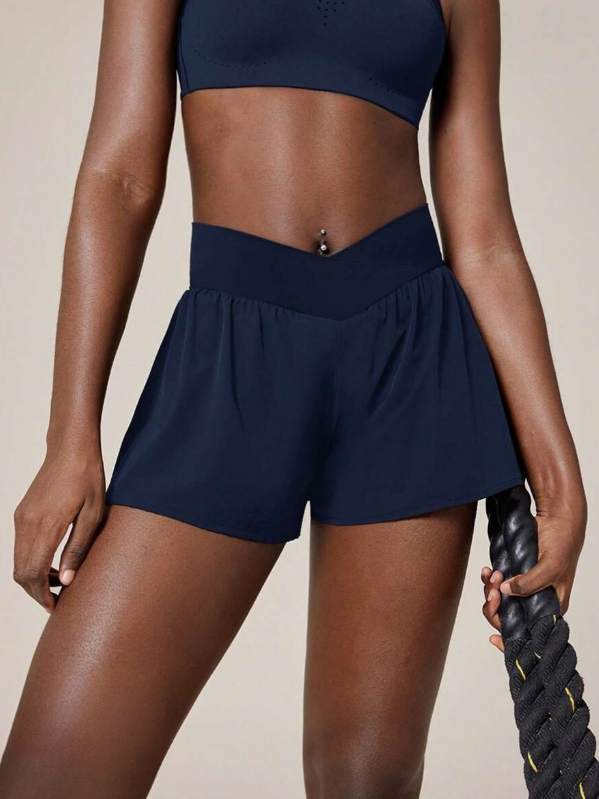 Schweißabweisende Laufshorts mit mittelhohem Bund, Taschen und schnelltrocknend